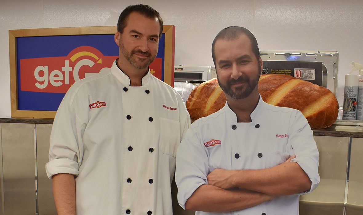 Chef Tom with a cardboard cutout of himself